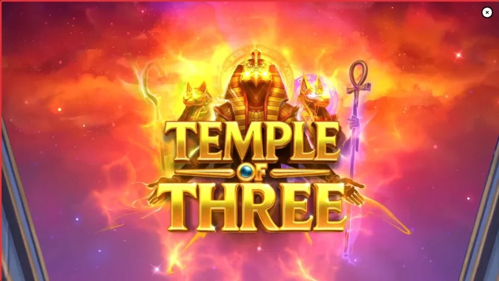 Temple of Three slot machine interface featuring ancient Egyptian tomb theme with glowing hieroglyphs and golden deity statues.
